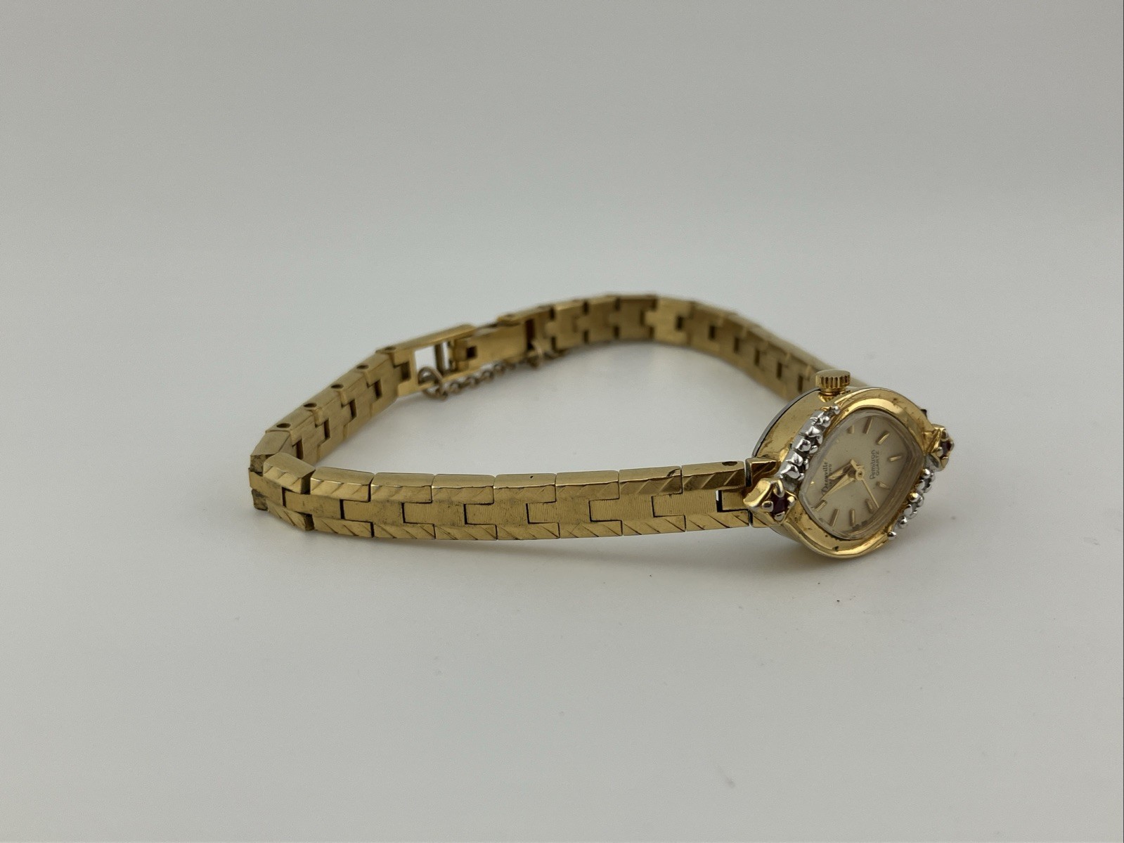 Vtg Deauville Ladies 15mm Watch Gold Tone Red Ruby/Diamond Bezel 7″ – RUNS