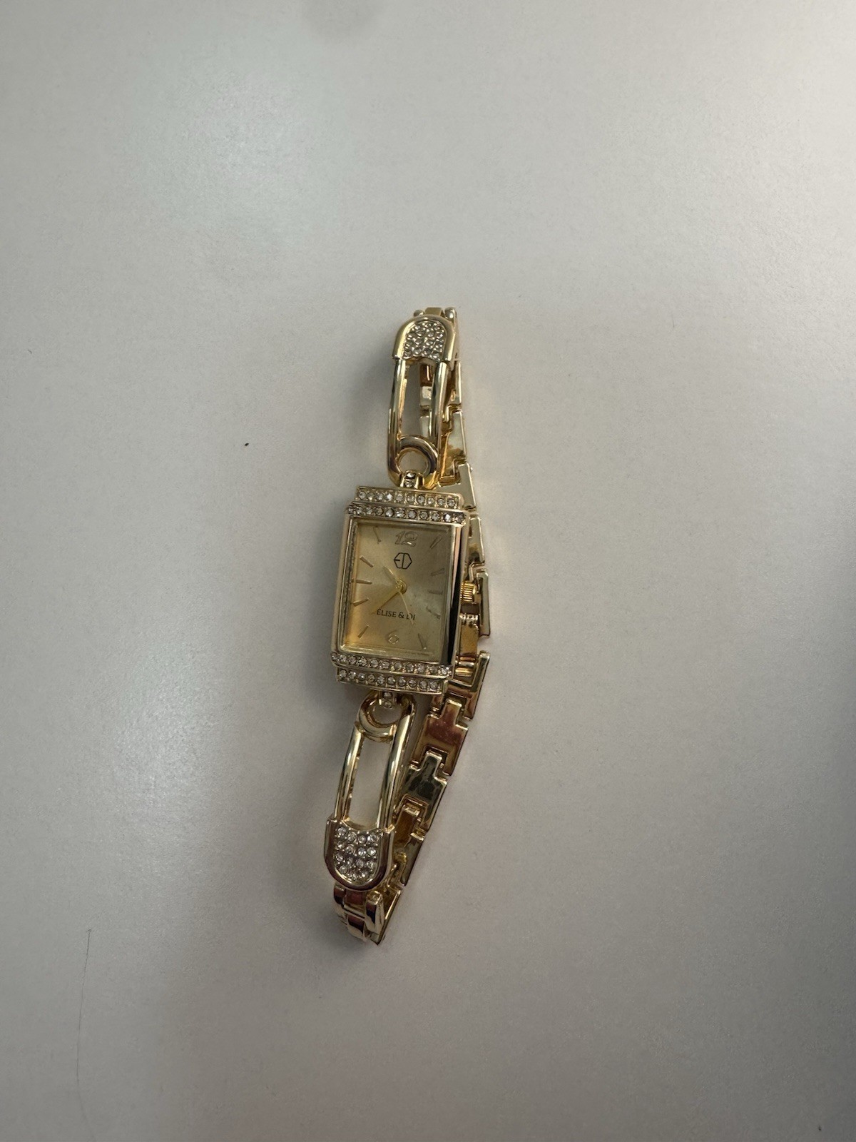 Vintage Gold Watch with Gemstone Accents