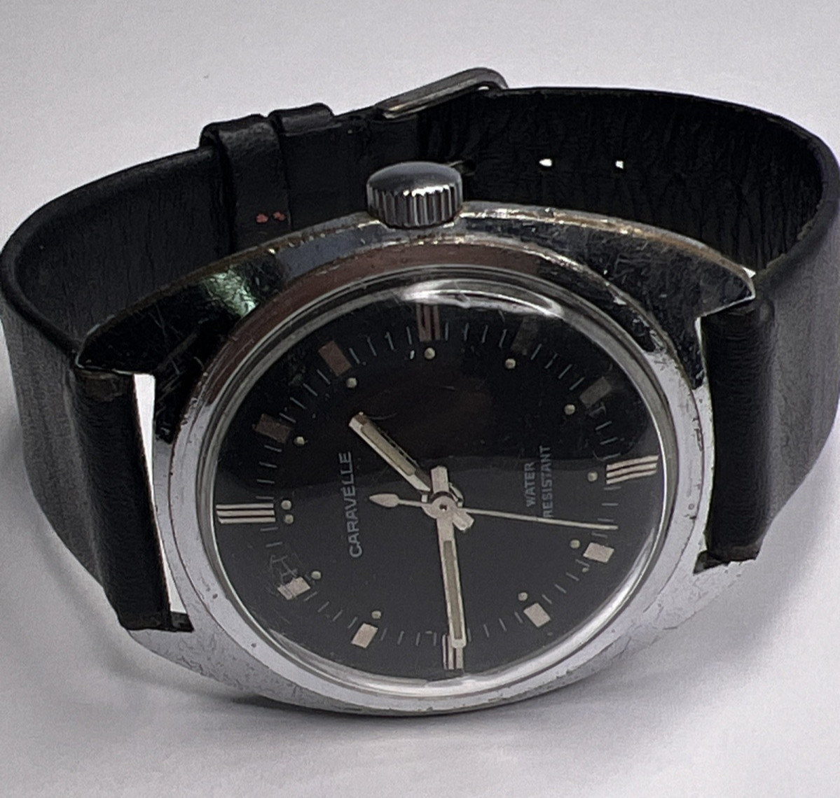 Caravelle 33.5mm Silver Tone Cushion Case Black Dial Manual Wind Leather Strap