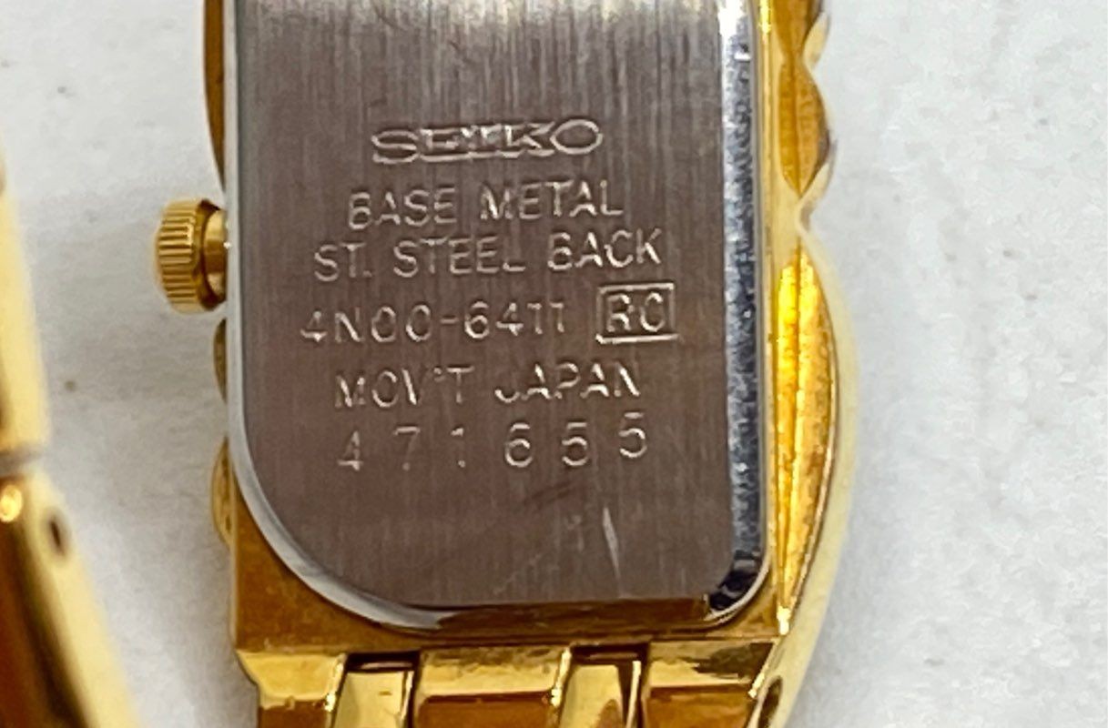 Vintage Seiko Women’s Gold Tone Asymmetrical Black Dial Quartz Watch 4N00-6411