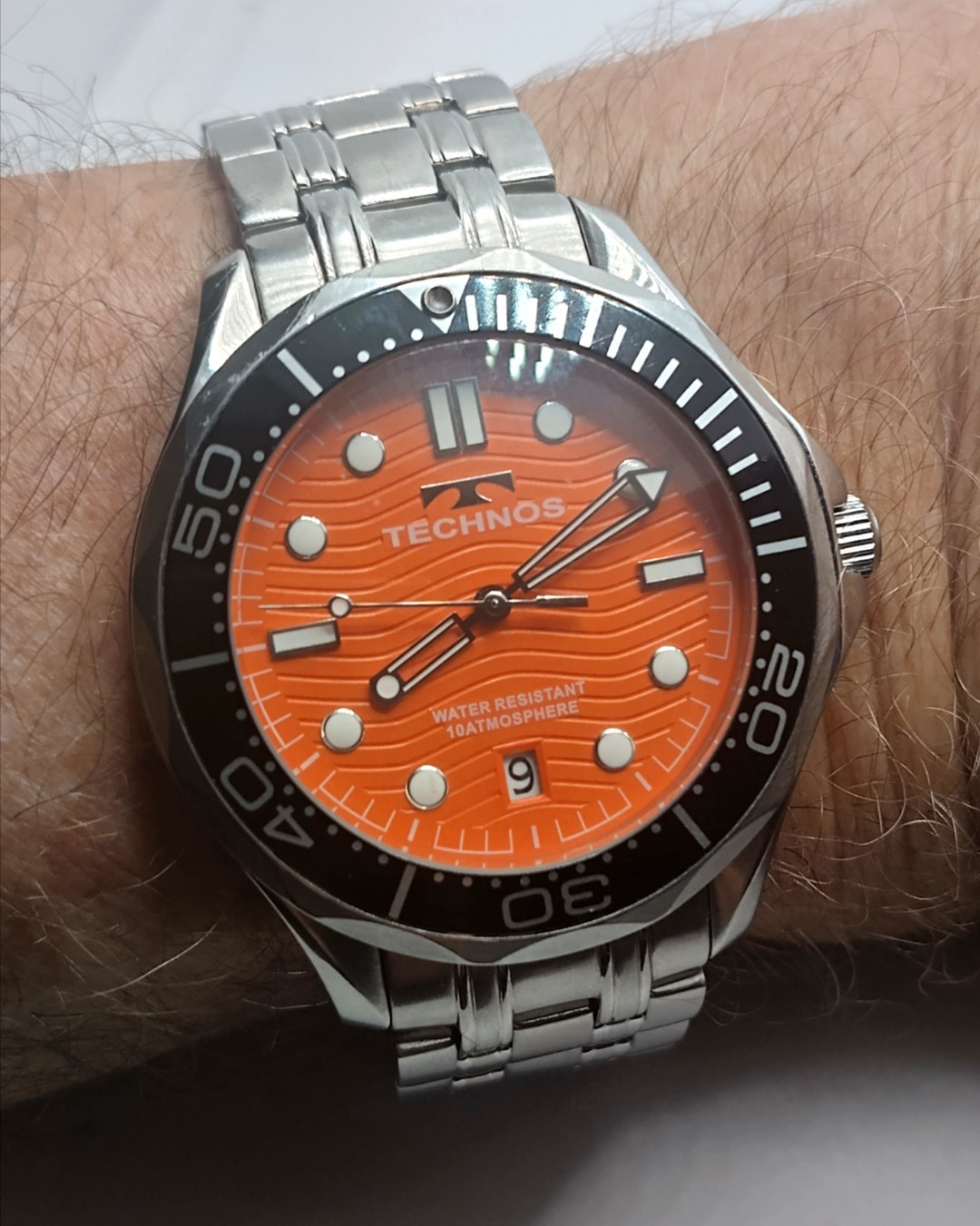 Technos Orange Dial Date Stainless Steel Quartz Men’s Quartz Watch Ref: T9691
