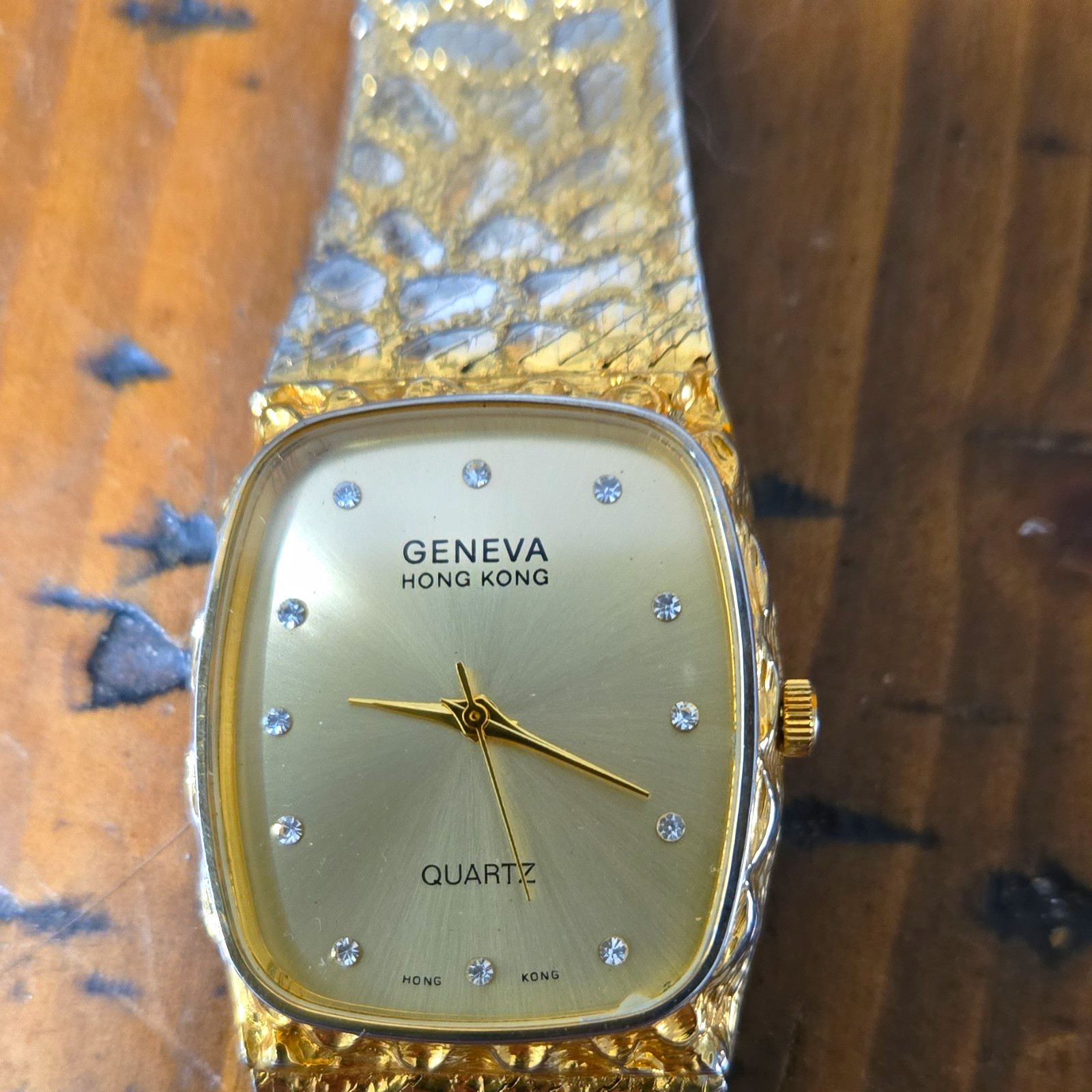Geneva Hong Kong Quartz Gold-Tone Cushion Case Bracelet Sunburst Dial Watch