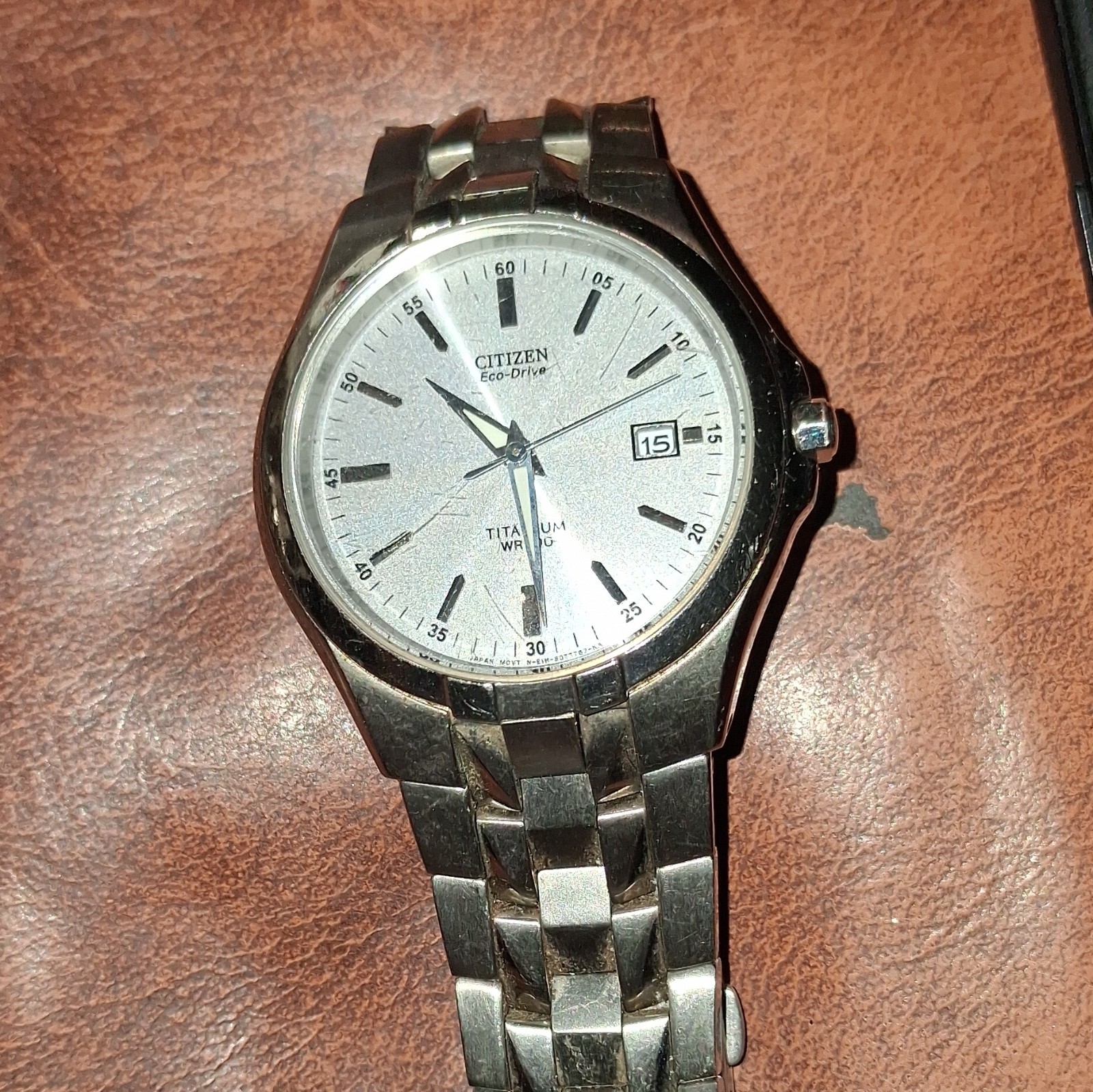 Citizen Eco-Drive Titanium WR100 Silver Dial Date Men’s Watch 40mm