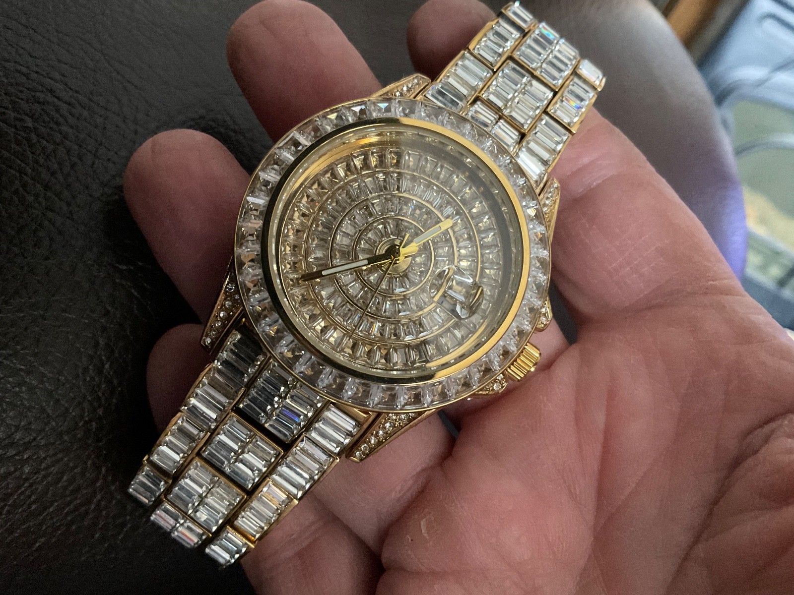 Crystal encrusted mens iced out watch never worn 1 crystal gone big 8 in fit?