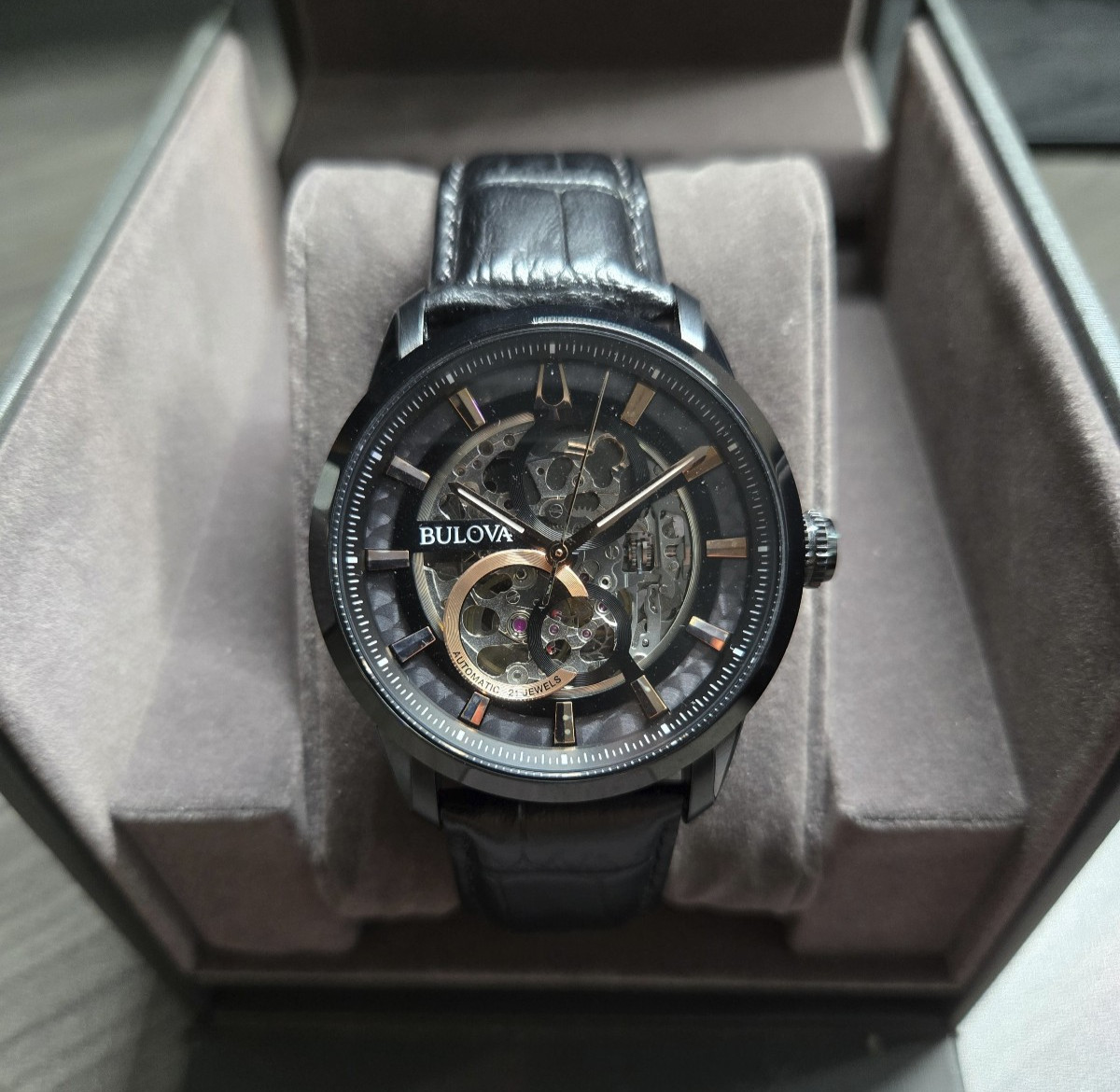Bulova Sutton Men’s 98A283 Black Rose Gold Accents Skeleton Automatic Watch 42mm