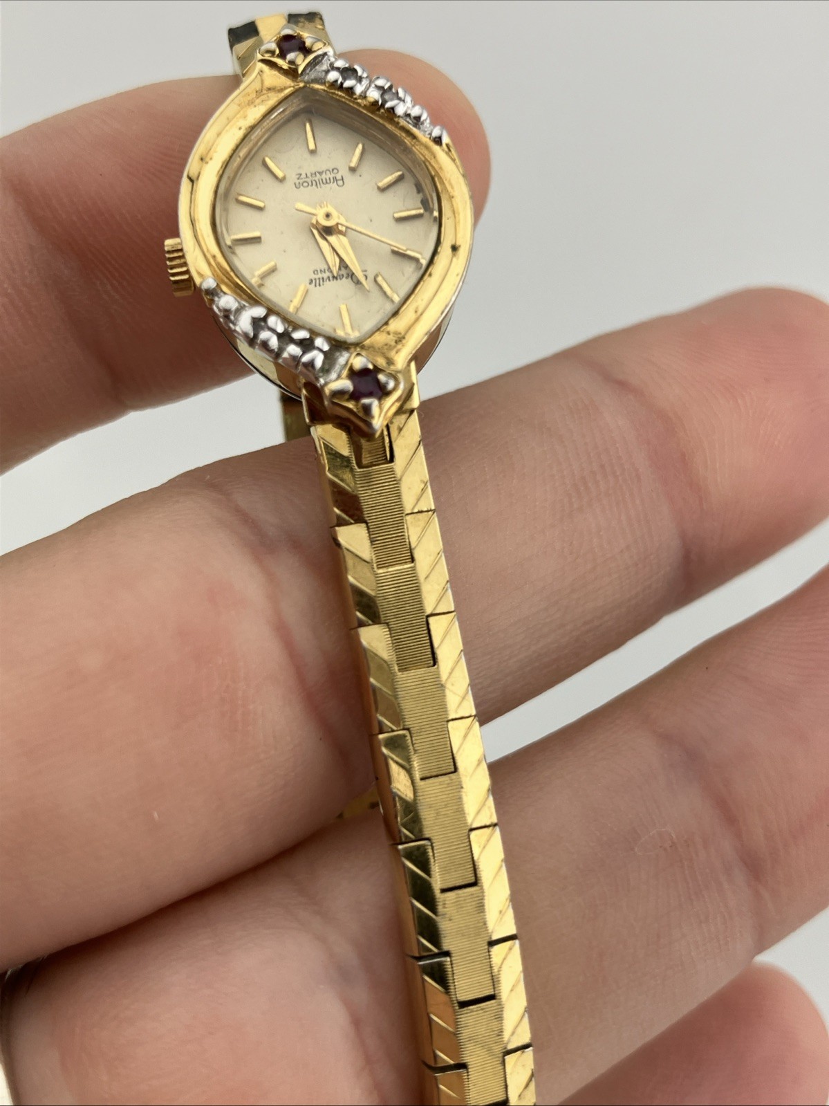 Vtg Deauville Ladies 15mm Watch Gold Tone Red Ruby/Diamond Bezel 7″ – RUNS