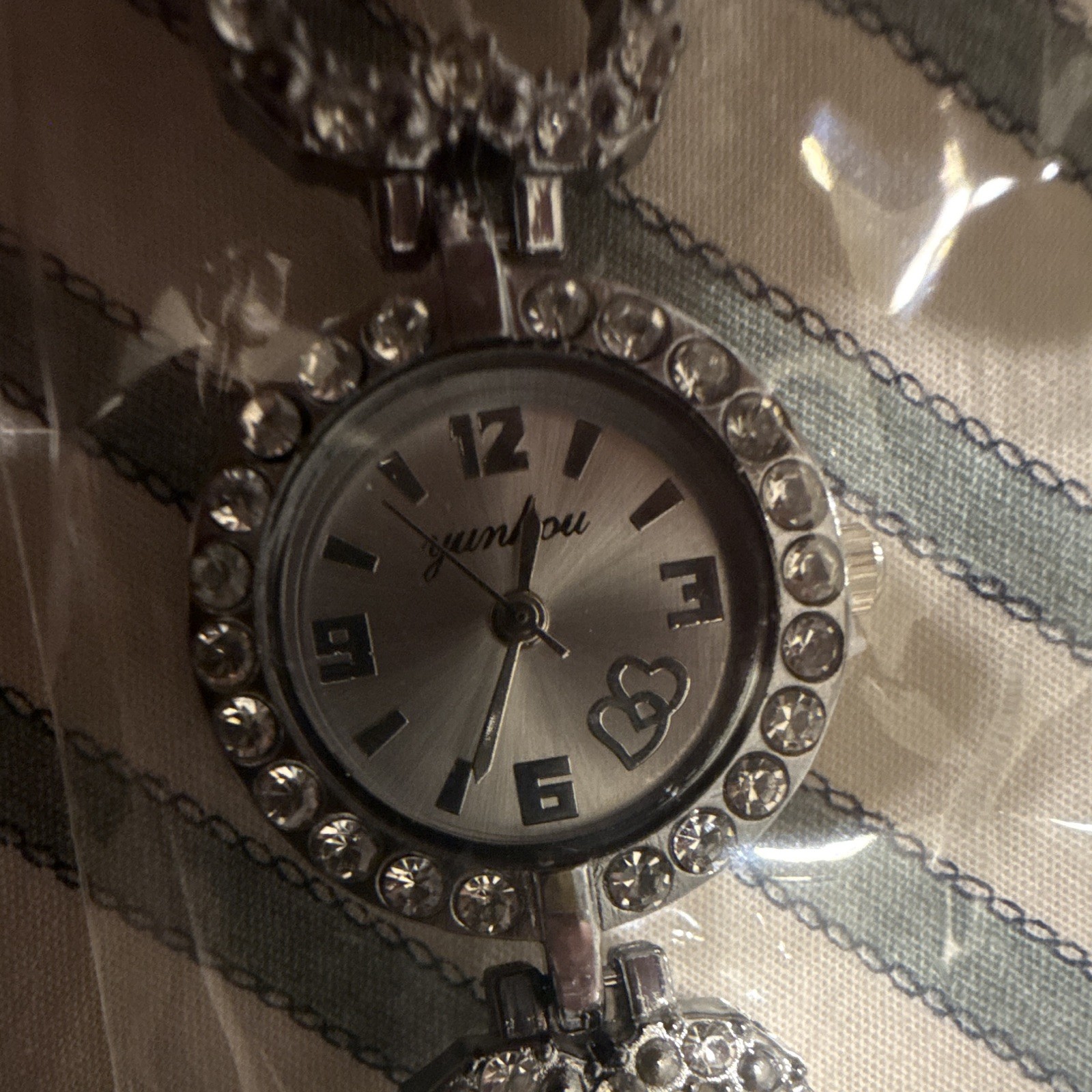 JunYou Women’s Quartz Analog Dress Watch Silver Dial Rhinestone Bezel