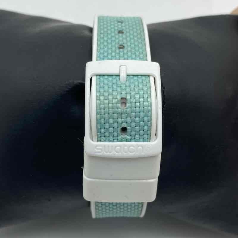 Swatch GW714 Pool Light 34mm Teal Dial Day Date Swiss Quartz Women’s Watch